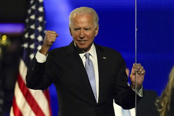 Biden promotes unity, turns to business of transition